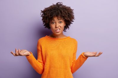 Woman shrugging